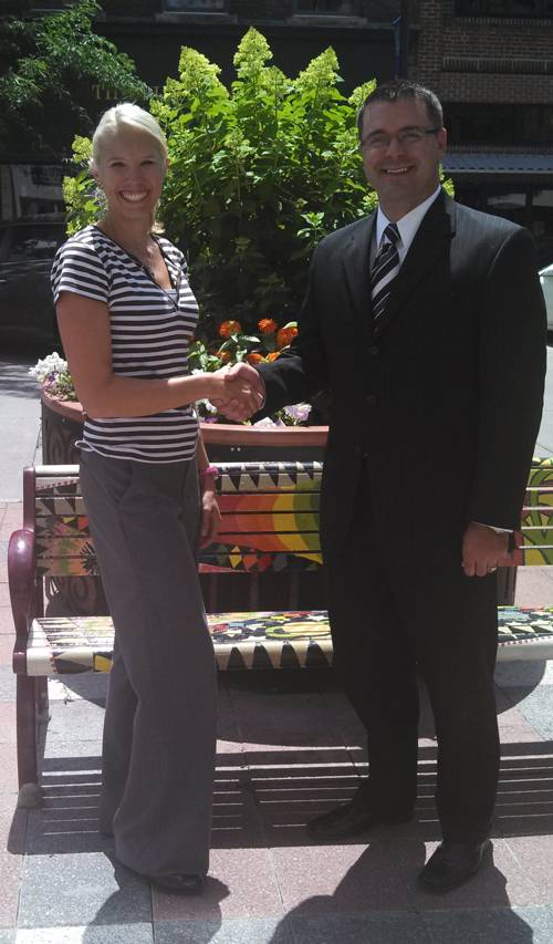 Foundation president Austin Woodin poses for a photograph with Cari Hague, Main Street Cultural District executive director.